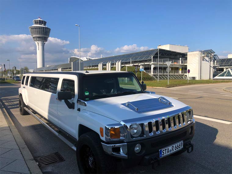 Hummer H3 weiß am Flughafen München mit Tower